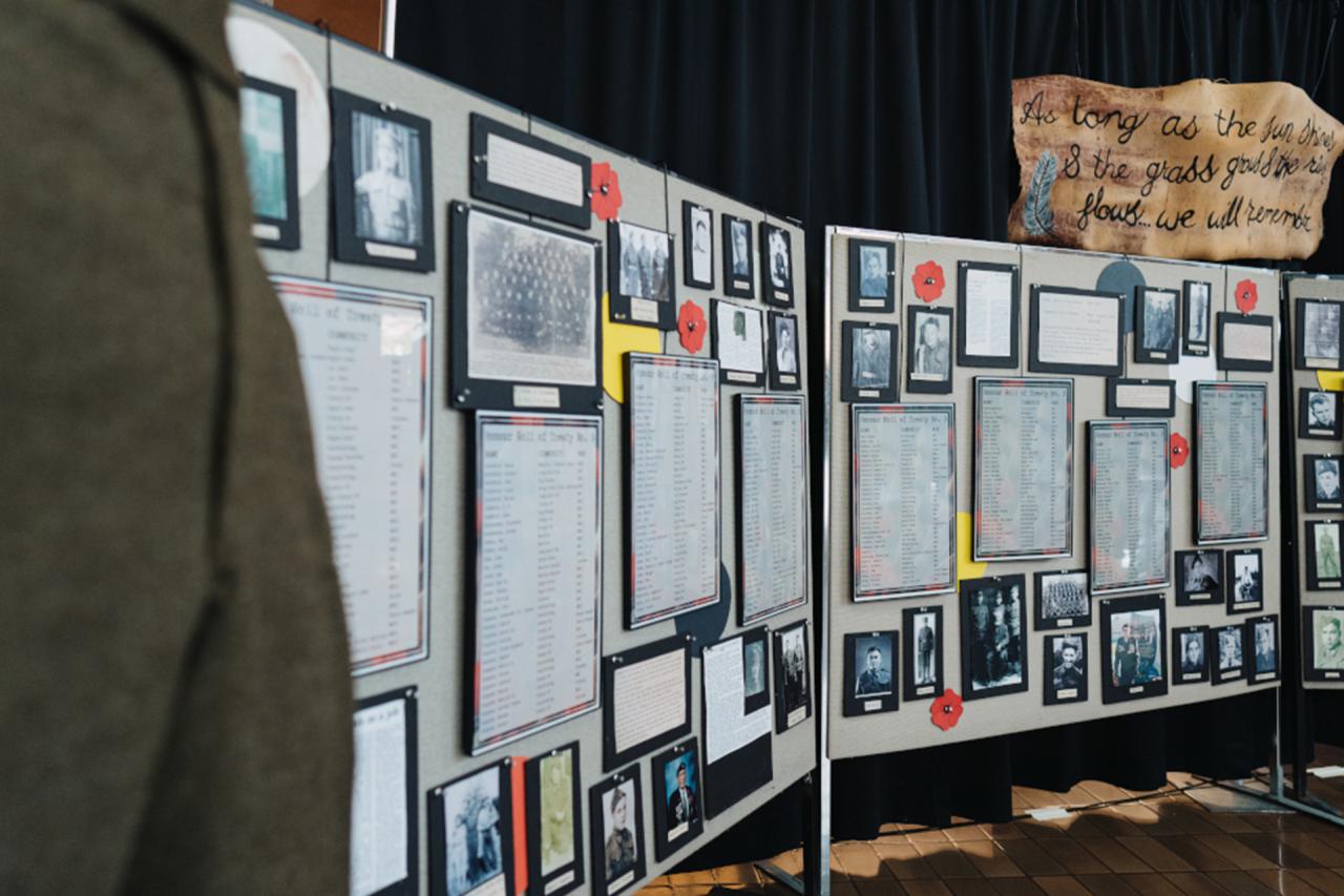 Exhibit featuring photos and artifacts from the World Wars for Indigenous Veterans Day