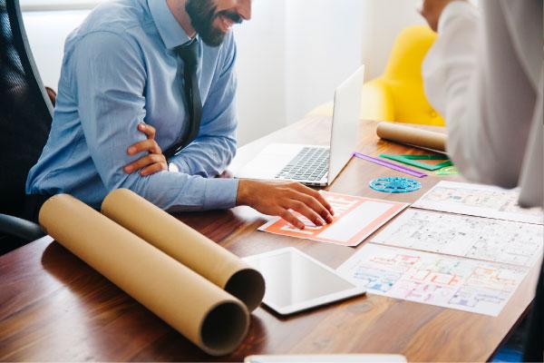 A photo of a man looking at business documents.